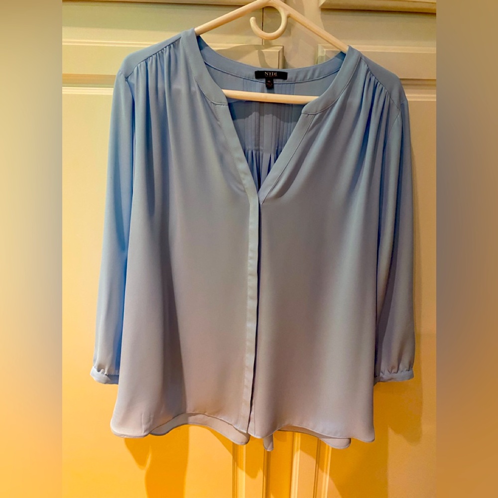 Light blue v necked blouse